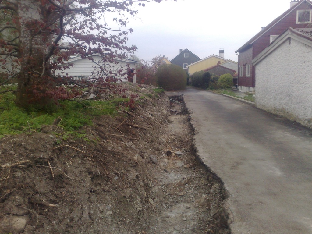 vei hvor veiskulderen har rast ned